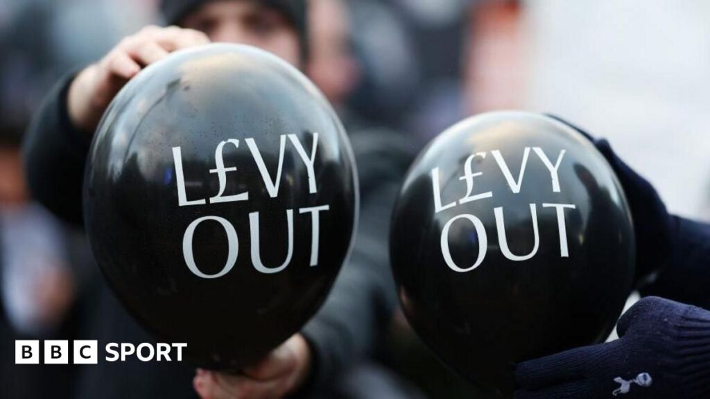 A group of Tottenham fans protesting against chairman Daniel Levy in December 2024