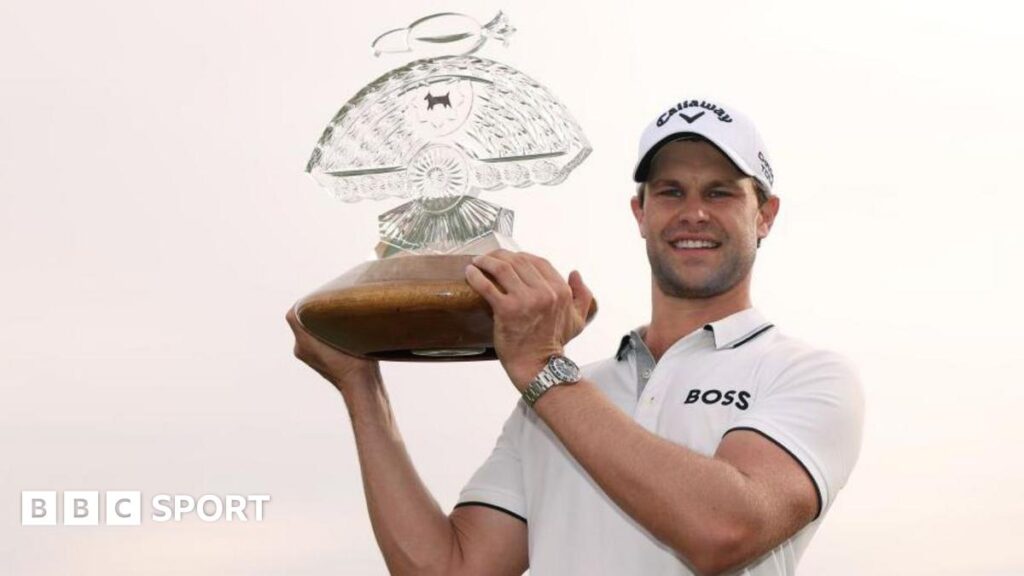 Thomas Detry lifts the Phoenix Open trophy