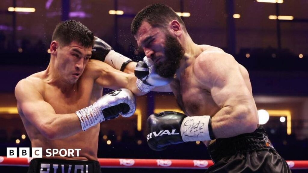 Dmitry Bivol punches Artur Beterbiev