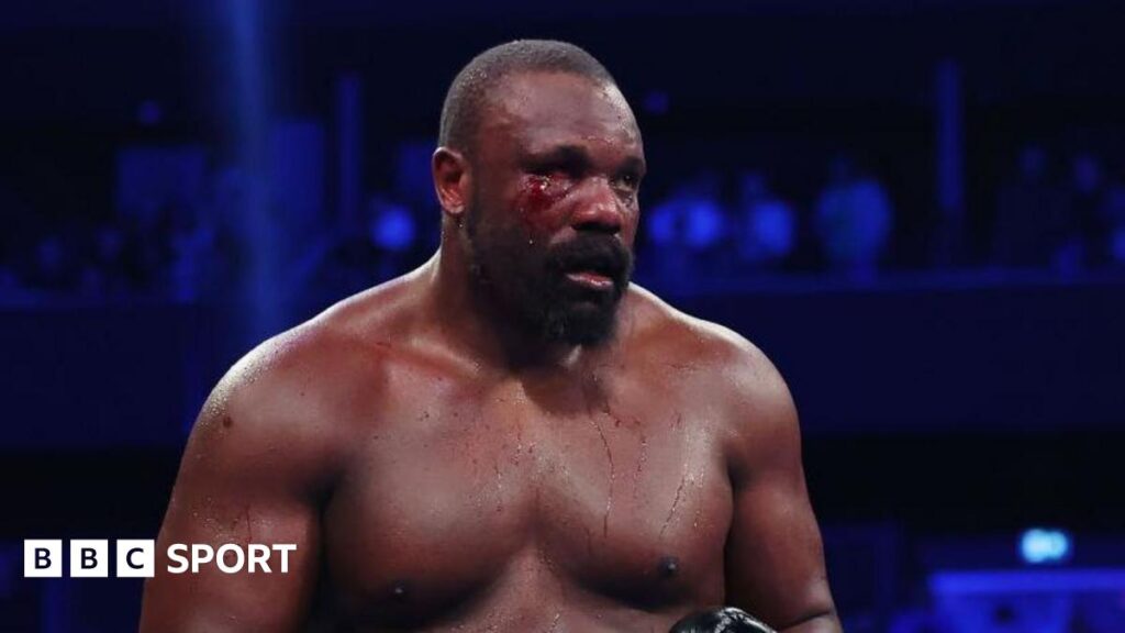 Derek Chisora with blood on his face