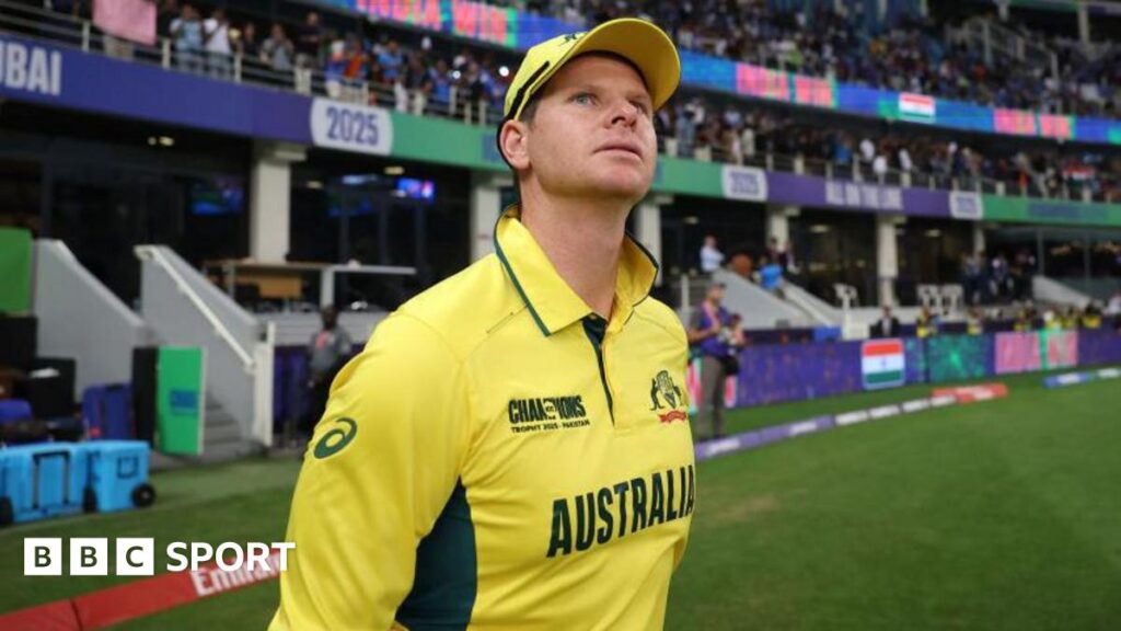 Steve Smith looks up after walking on to the pitch