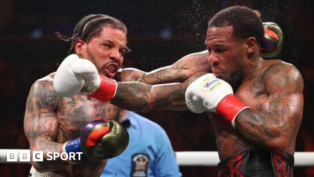 Gervonta Davis exchanges punches with Lamont Roach Jr during their WBA lightweight title bout