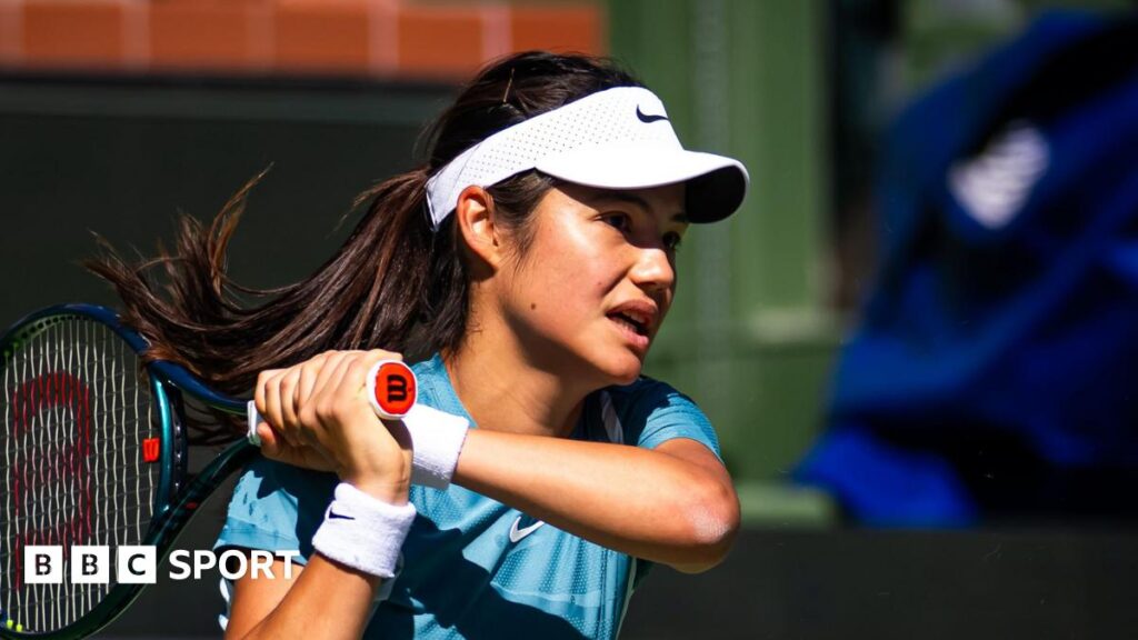 Emma Raducanu hits a return during practice in Indian Wells